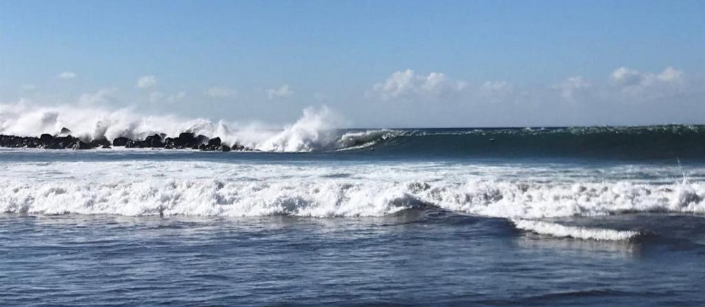a large wave in the ocean with at Dream View in Adeje