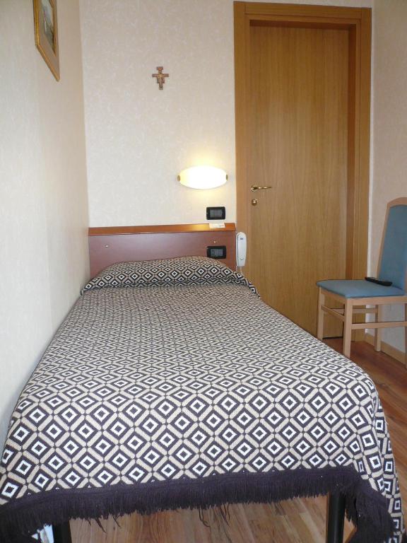 Postel nebo postele na pokoji v ubytování Albergo Belvedere
