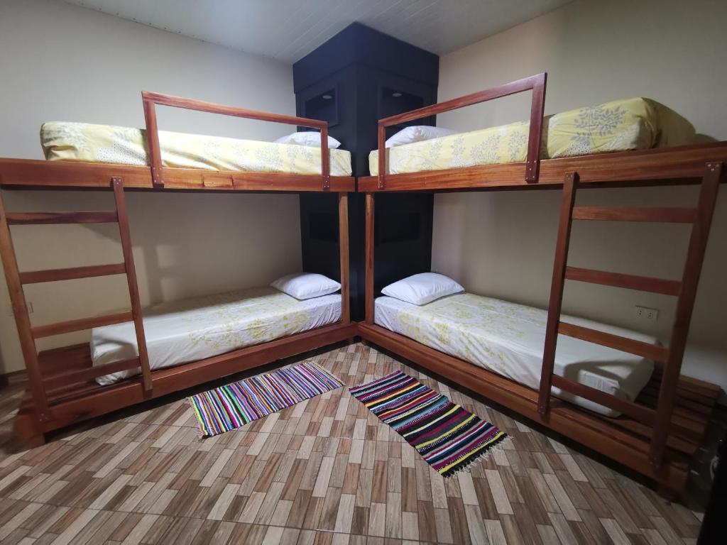 Postel nebo postele na pokoji v ubytování Casa Alamanda - Posada Urbana