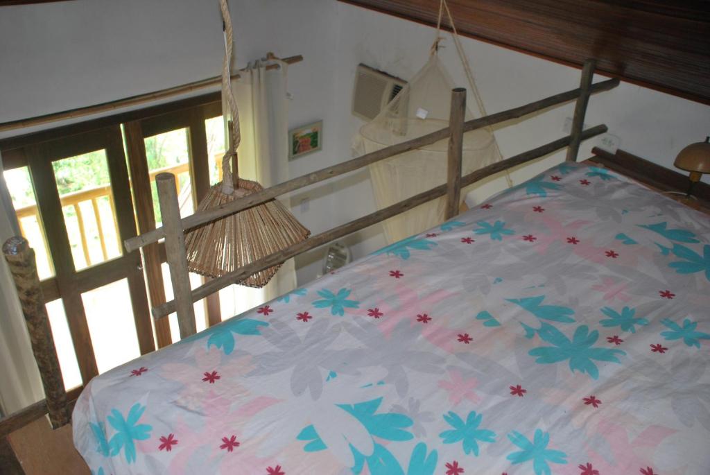 Postel nebo postele na pokoji v ubytování Casa do Capão