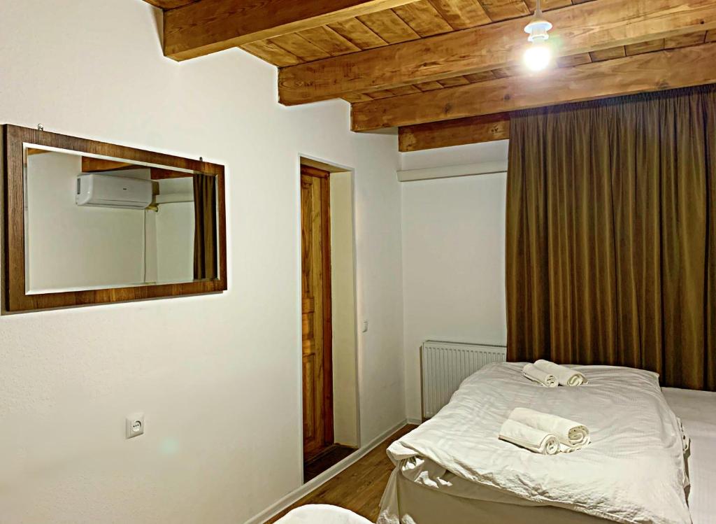 Postel nebo postele na pokoji v ubytování Old City Hotel