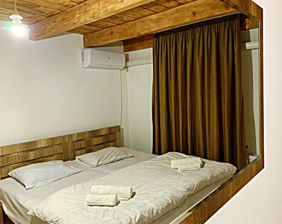 Postel nebo postele na pokoji v ubytování Old City Hotel