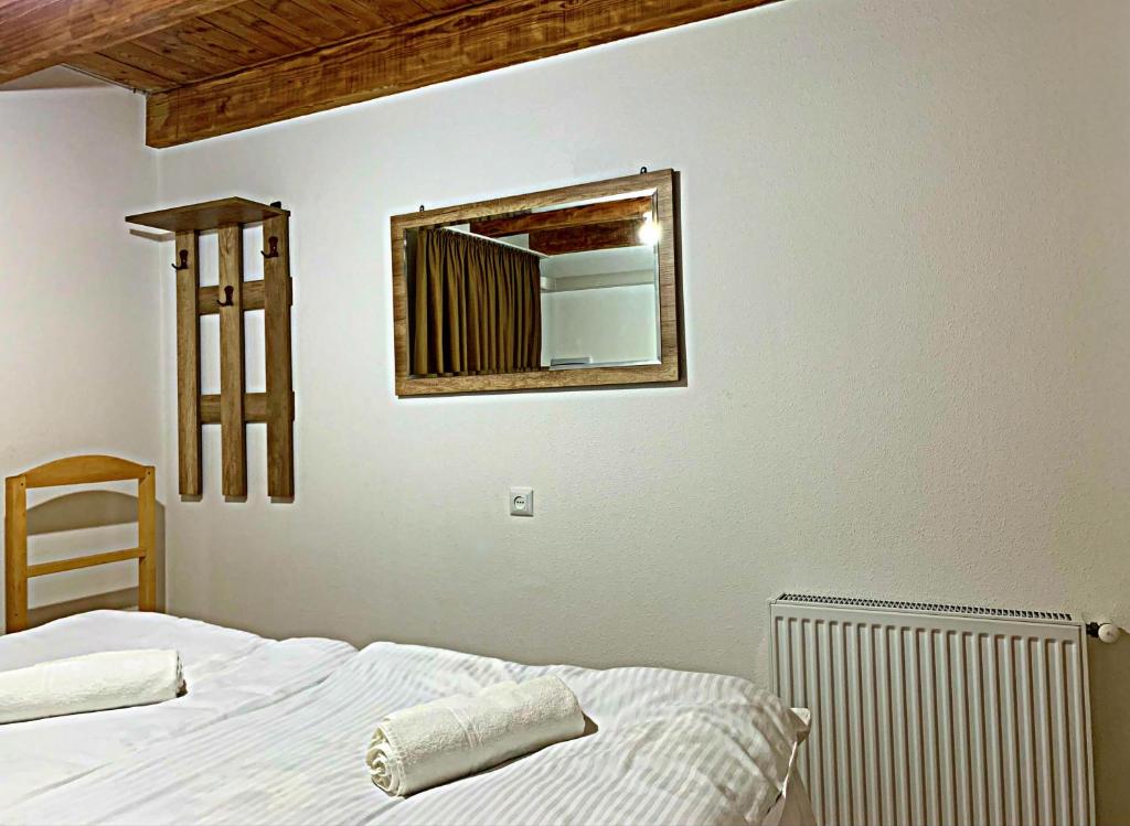 Postel nebo postele na pokoji v ubytování Old City Hotel