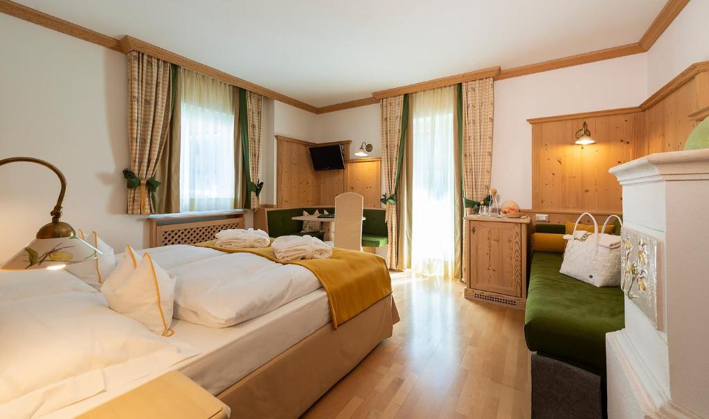 Postel nebo postele na pokoji v ubytování Hotel Teresa