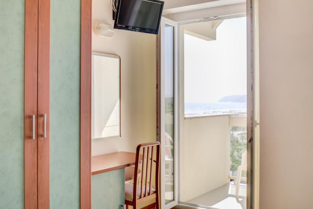 TV a/nebo společenská místnost v ubytování Hotel Astoria