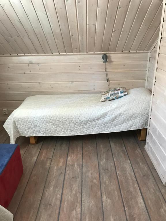 Postel nebo postele na pokoji v ubytování Villa Somosenranta