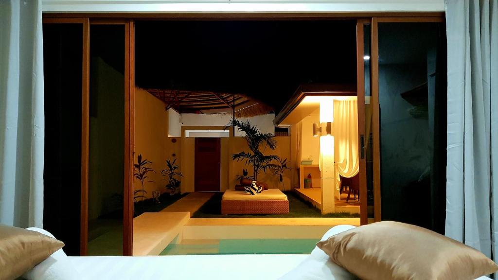 Postel nebo postele na pokoji v ubytování Montecarlo Villas Panglao