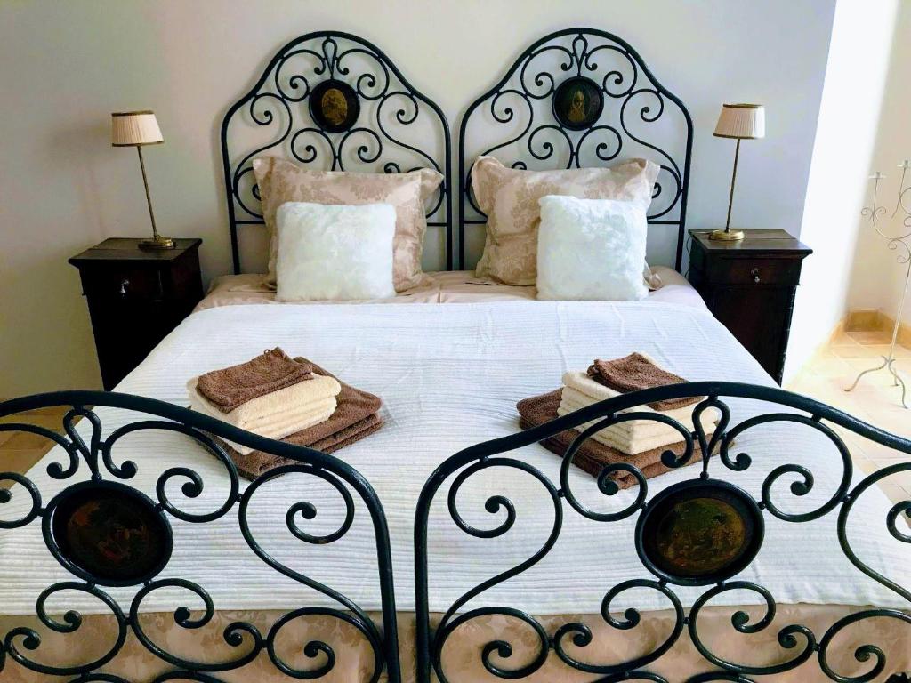 Krevet ili kreveti u jedinici u okviru objekta Charmante vakantiewoning 'Casa Di Tonno'