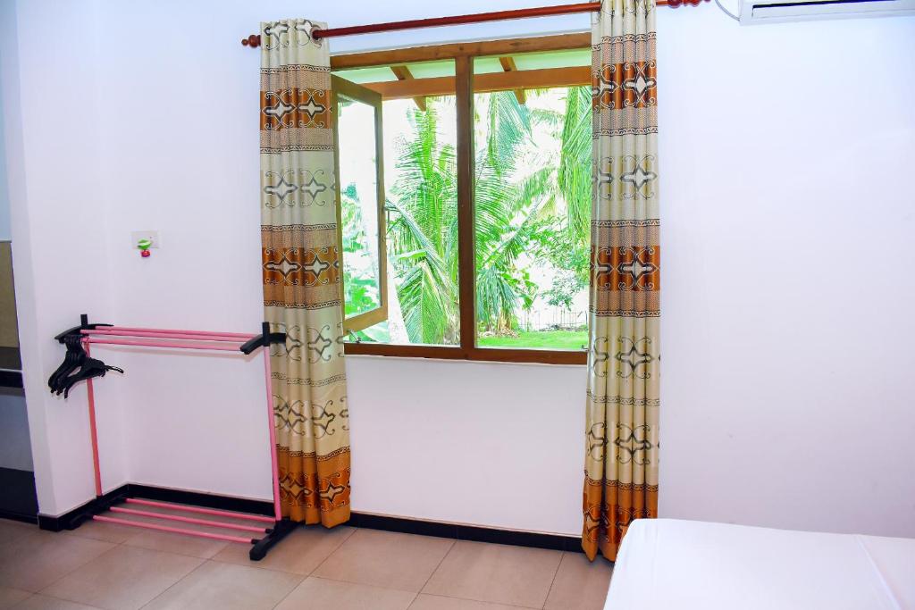 Postel nebo postele na pokoji v ubytování Megabe Villa