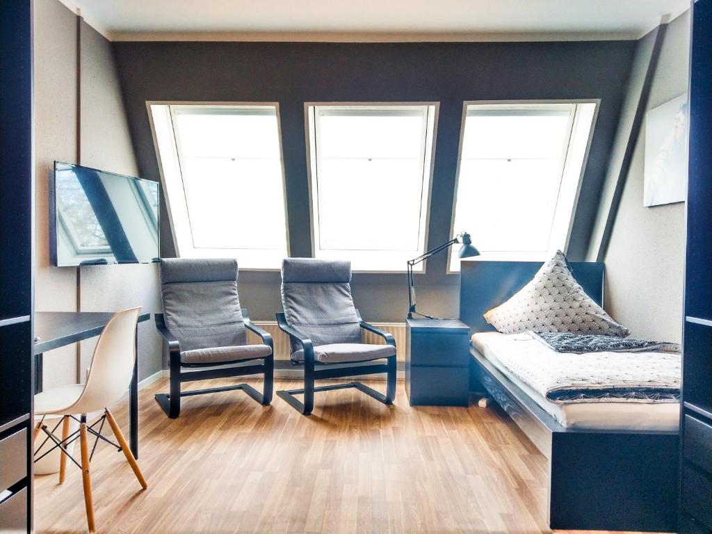 Et sittehjørne på Moderne Monteurwohnung mit Dachterrasse für 4 Personen