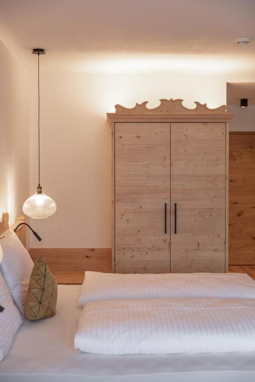 A bed or beds in a room at Rohrmooser Schlössl