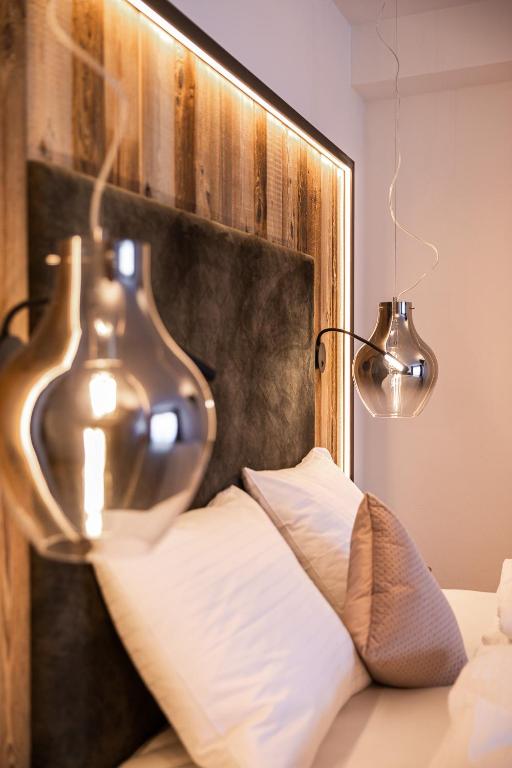 A bed or beds in a room at Rohrmooser Schlössl