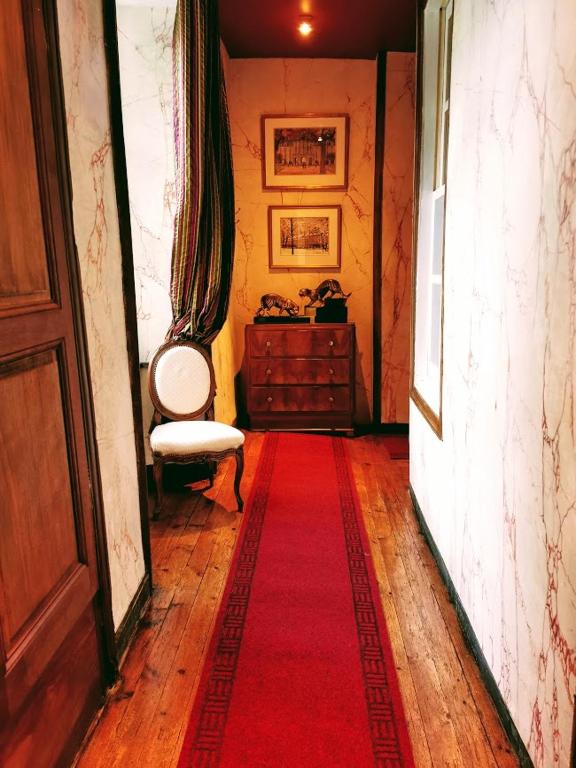 Posezení v ubytování Les chambres d'hôtes du Manoir de Roz-Maria