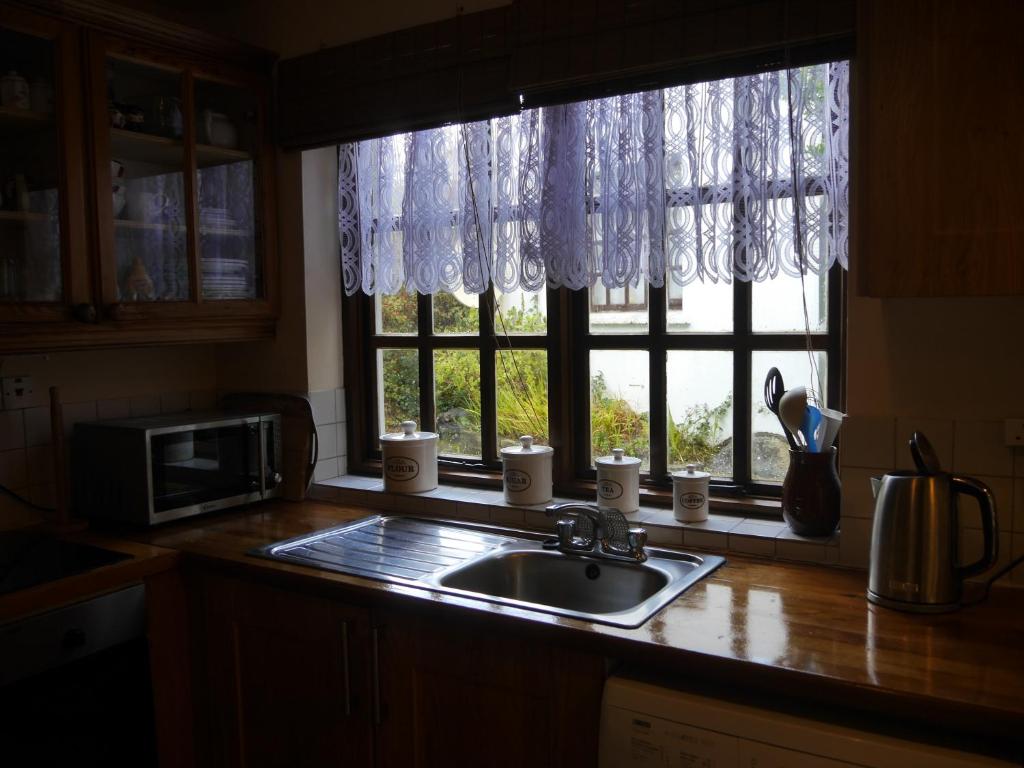 Kuchyň nebo kuchyňský kout v ubytování Wild Kerry Lodge