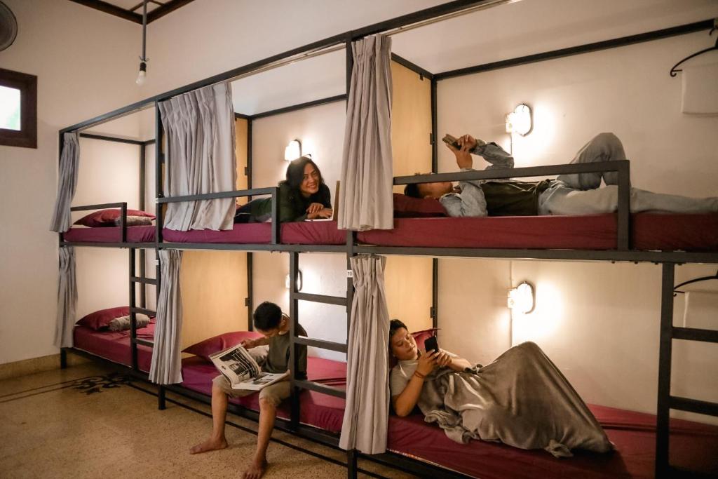 Postel nebo postele na pokoji v ubytování SEMERU HOSTEL MALANG