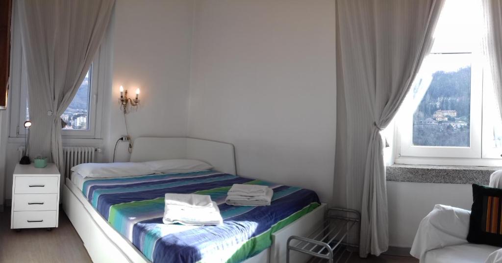 Postel nebo postele na pokoji v ubytování B&B Casa Cantoniera