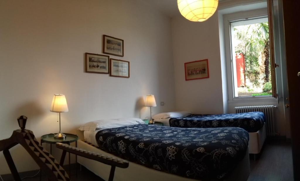 Postel nebo postele na pokoji v ubytování B&B Casa Cantoniera