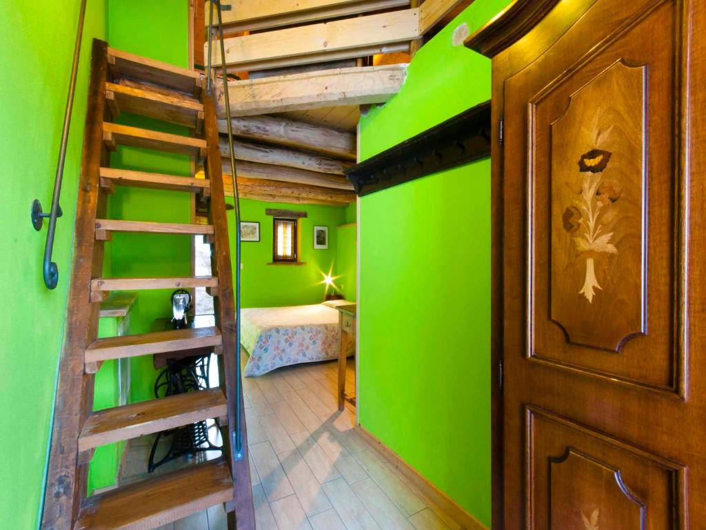 Ένα ή περισσότερα κρεβάτια σε δωμάτιο στο Agriturismo Al Marnich