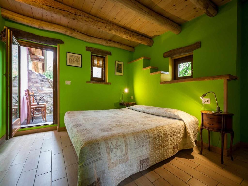 Ένα ή περισσότερα κρεβάτια σε δωμάτιο στο Agriturismo Al Marnich
