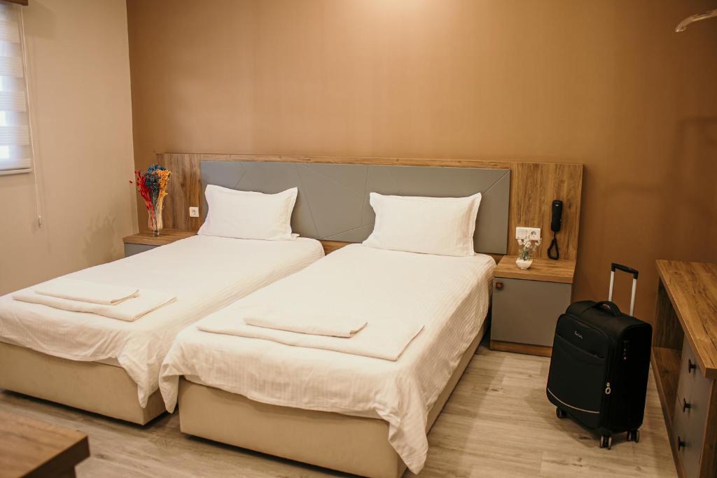 Кровать или кровати в номере Hayat Palas