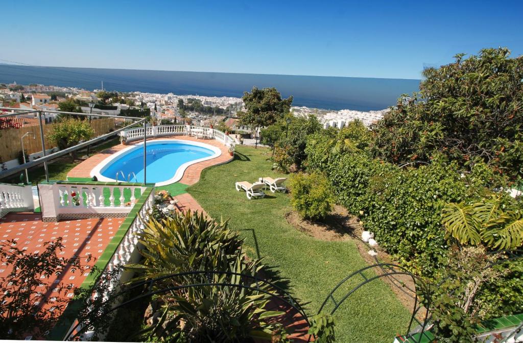 Bazén v ubytování Villa Rosario SpainSunRentals 1070 nebo v jeho okolí