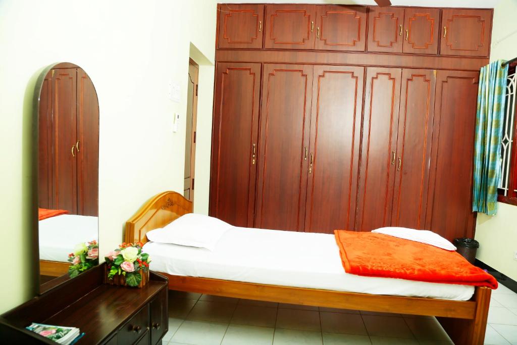 Postel nebo postele na pokoji v ubytování ZuriEL Suite GUEST HOUSE