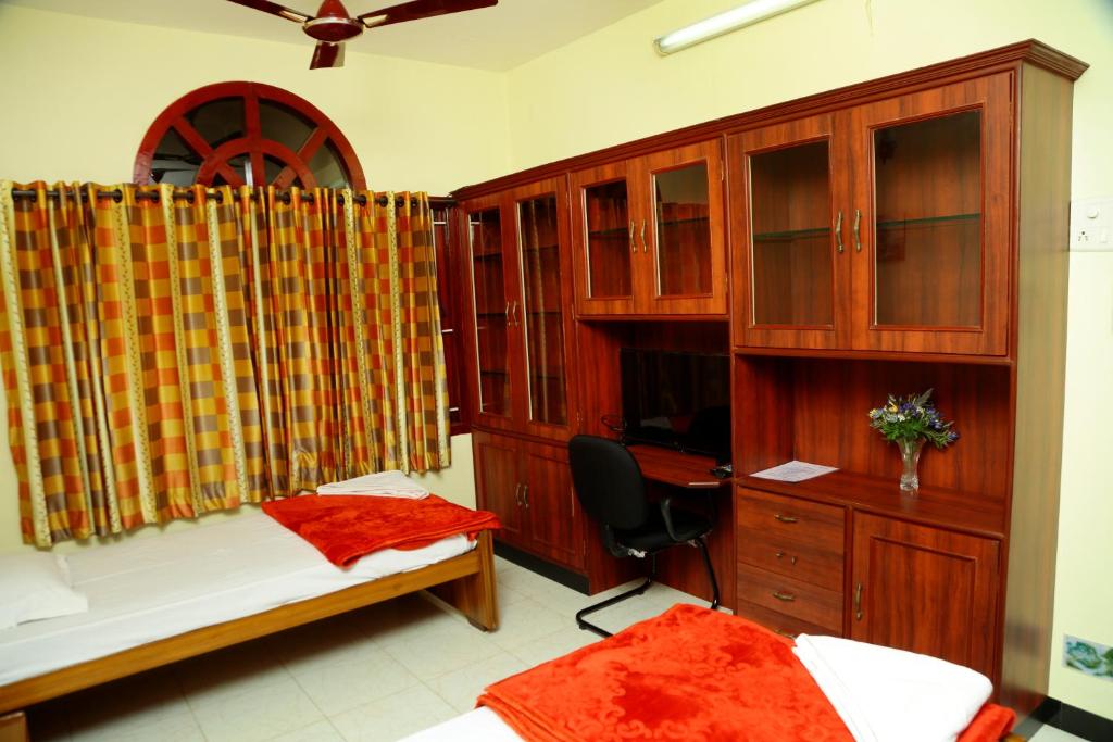 Postel nebo postele na pokoji v ubytování ZuriEL Suite GUEST HOUSE
