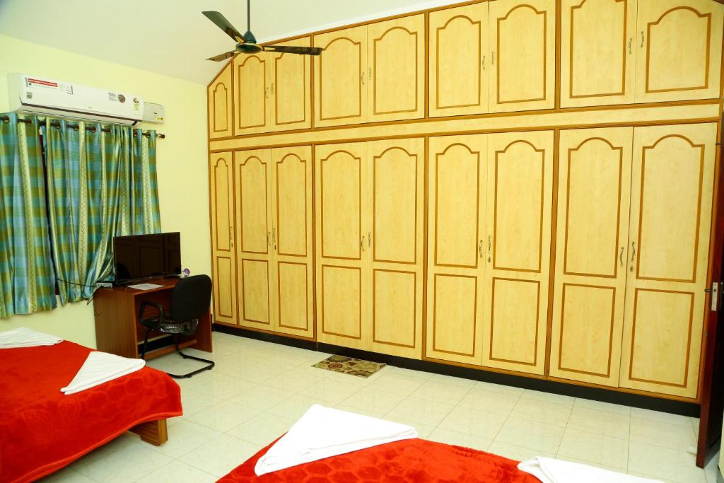 Postel nebo postele na pokoji v ubytování ZuriEL Suite GUEST HOUSE