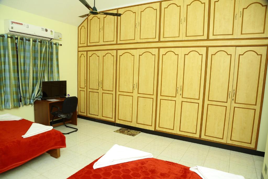 Postel nebo postele na pokoji v ubytování ZuriEL Suite GUEST HOUSE