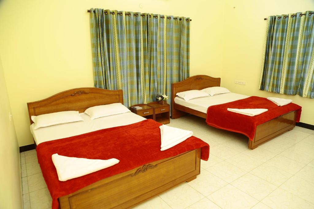 Postel nebo postele na pokoji v ubytování ZuriEL Suite GUEST HOUSE