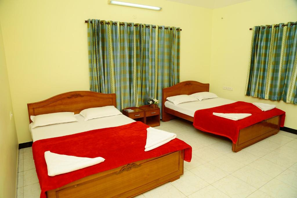 Postel nebo postele na pokoji v ubytování ZuriEL Suite GUEST HOUSE