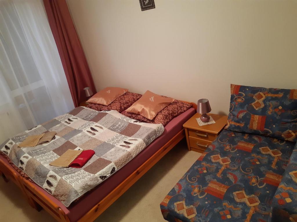 Postel nebo postele na pokoji v ubytování Apartmán Tatry Tatranská Štrba