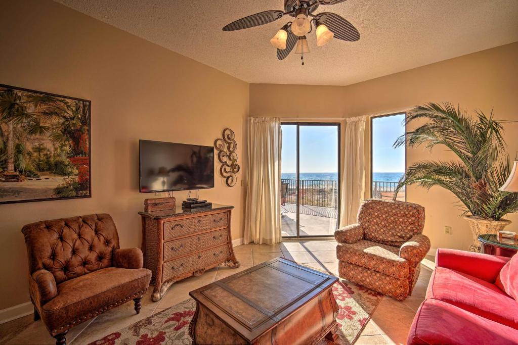 a living room with a couch and chairs and a window at Gulf Coast Luxury Getaway on Orange Beach with Views in Orange Beach