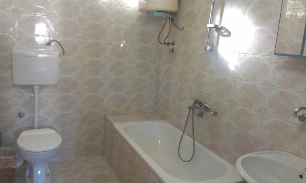 Koupelna v ubytování Guesthouse Sinani