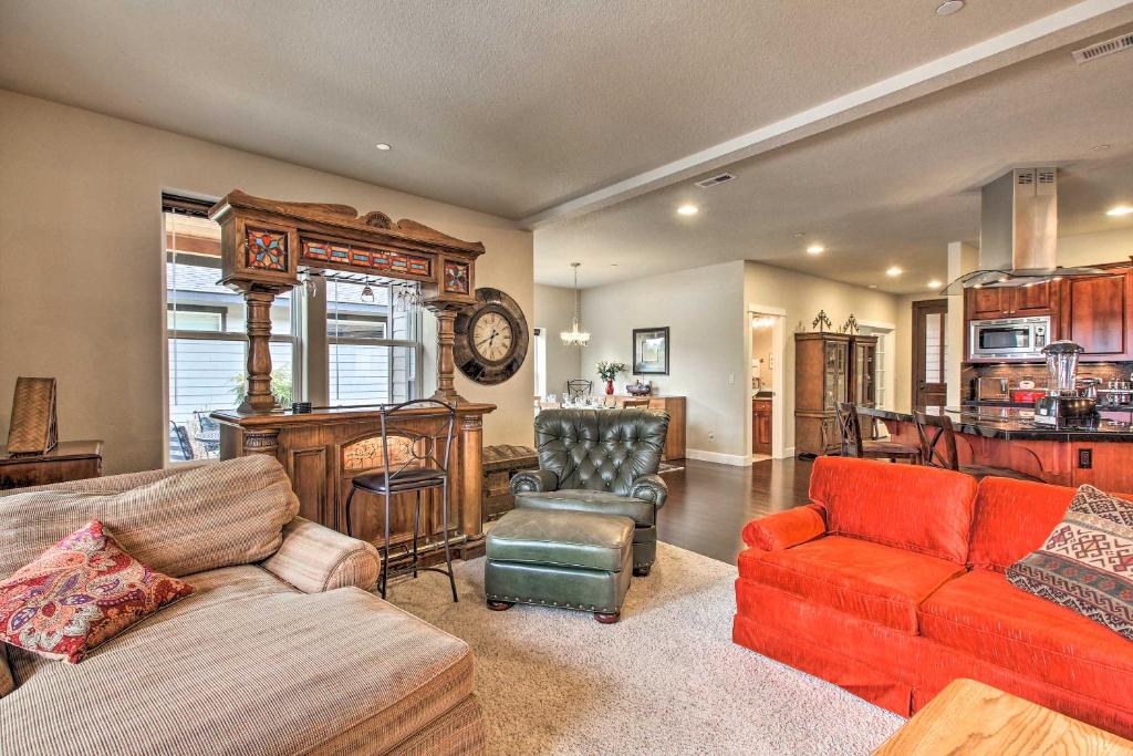 a living room with a couch and a chair at The Ark at Farewell Park, 20 Mi to Mt Bachelor! in Bend