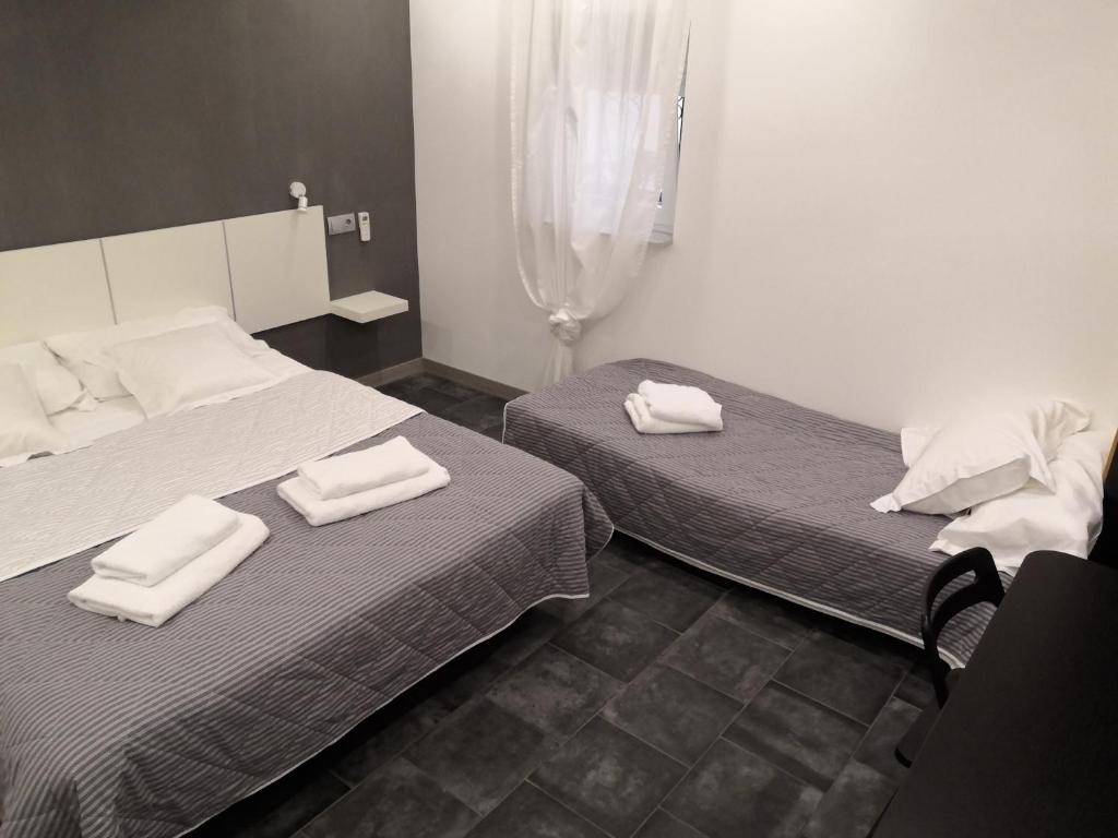 Posteľ alebo postele v izbe v ubytovaní ASV Apartments