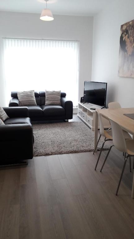 TV a/nebo společenská místnost v ubytování Lynn's Liverpool Apartment