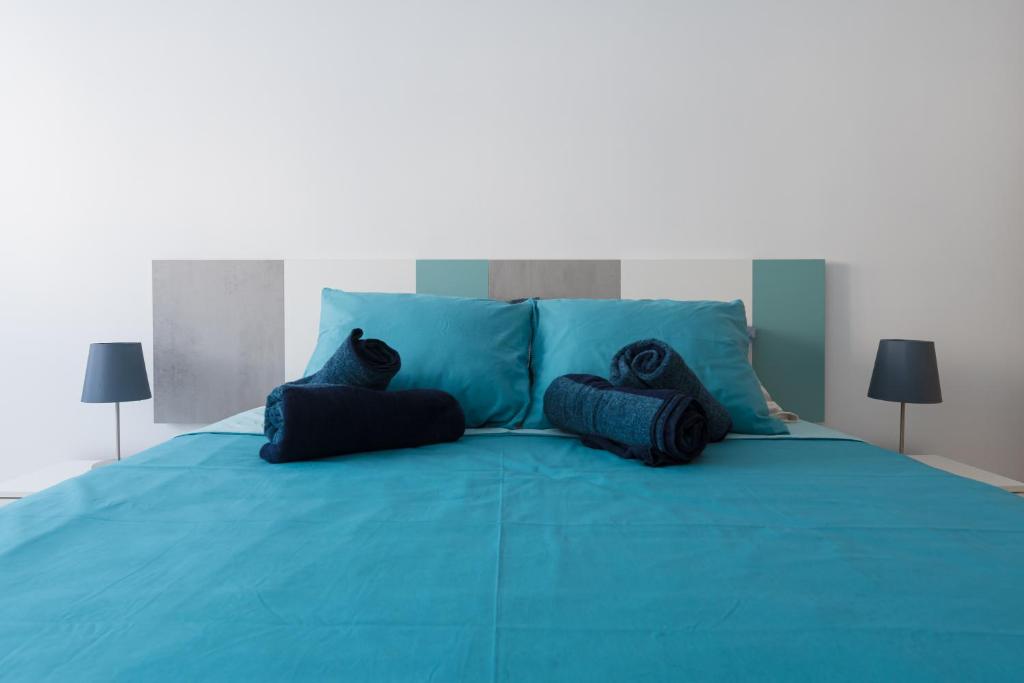 A bed or beds in a room at Casa Elena - Cabo de Gata