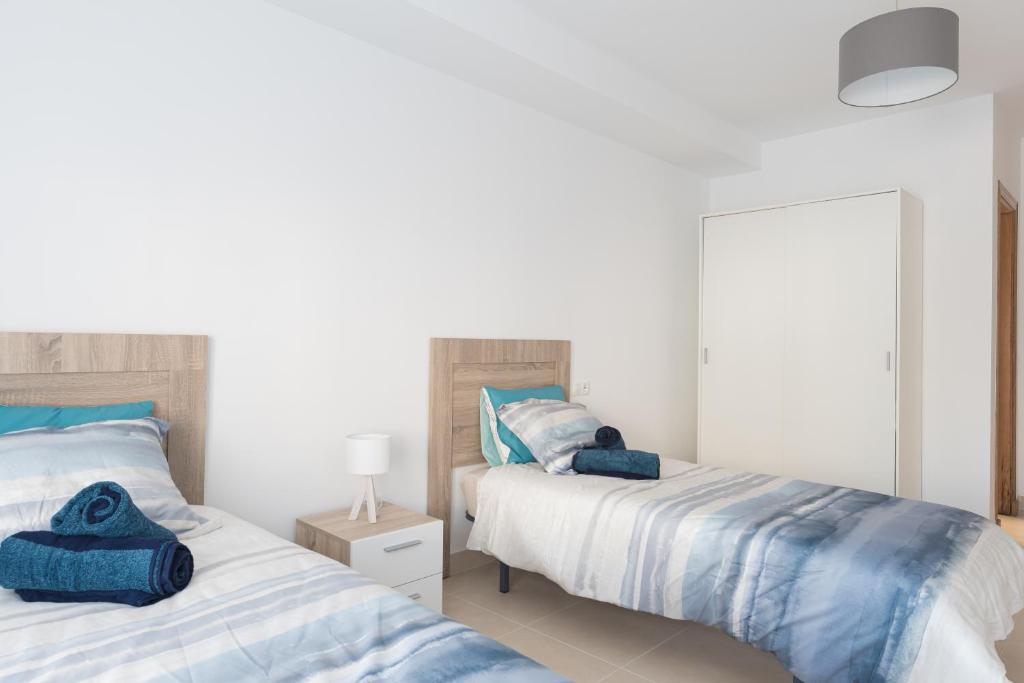 A bed or beds in a room at Casa Elena - Cabo de Gata