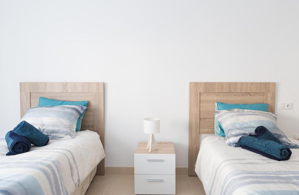 A bed or beds in a room at Casa Elena - Cabo de Gata
