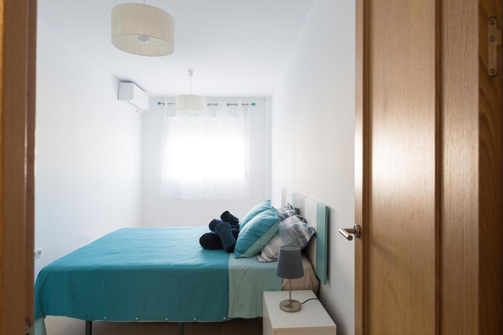 A bed or beds in a room at Casa Elena - Cabo de Gata