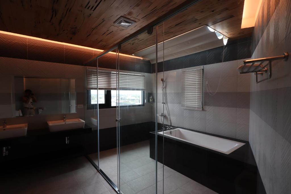 Postel nebo postele na pokoji v ubytování Qian Qian Riverside B&B
