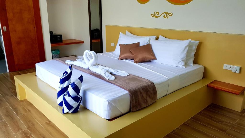 Postel nebo postele na pokoji v ubytování Montecarlo Villas Panglao