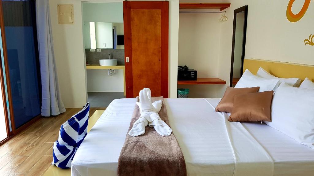 Postel nebo postele na pokoji v ubytování Montecarlo Villas Panglao