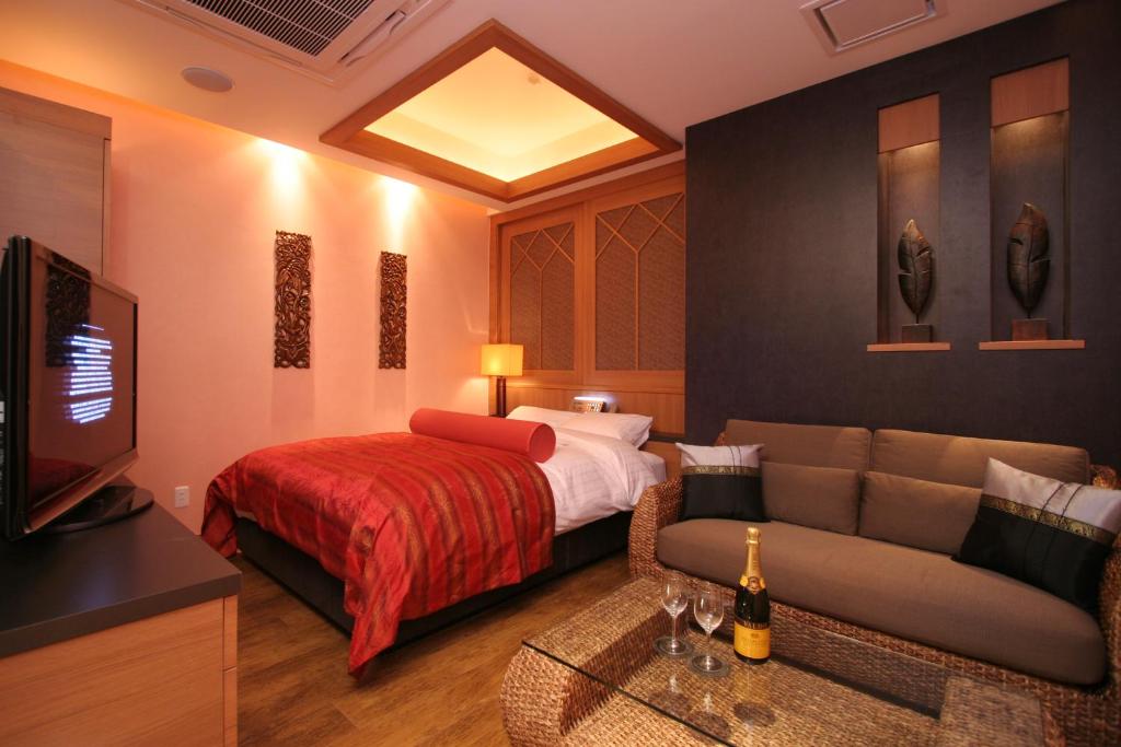 Postel nebo postele na pokoji v ubytování HOTEL W-PREMIUM -W GROUP HOTELS and RESORTS-