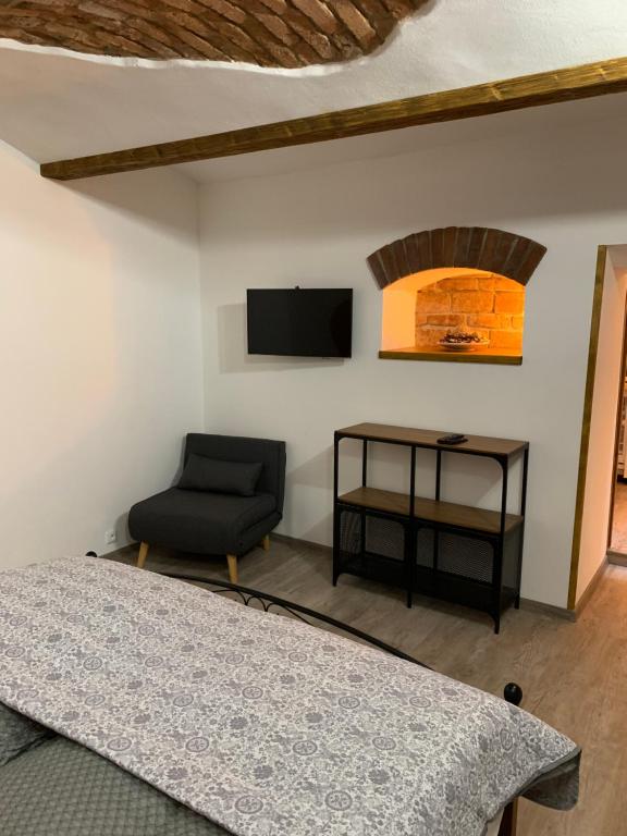 Postel nebo postele na pokoji v ubytování Apartmany Pod Kloboukem
