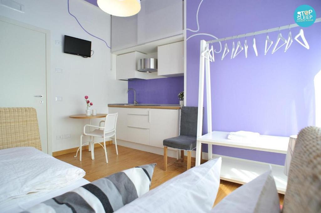 Postel nebo postele na pokoji v ubytování Stop & Sleep Udine Fronte Ospedale Civile