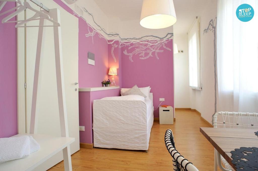 Postel nebo postele na pokoji v ubytování Stop & Sleep Udine Fronte Ospedale Civile