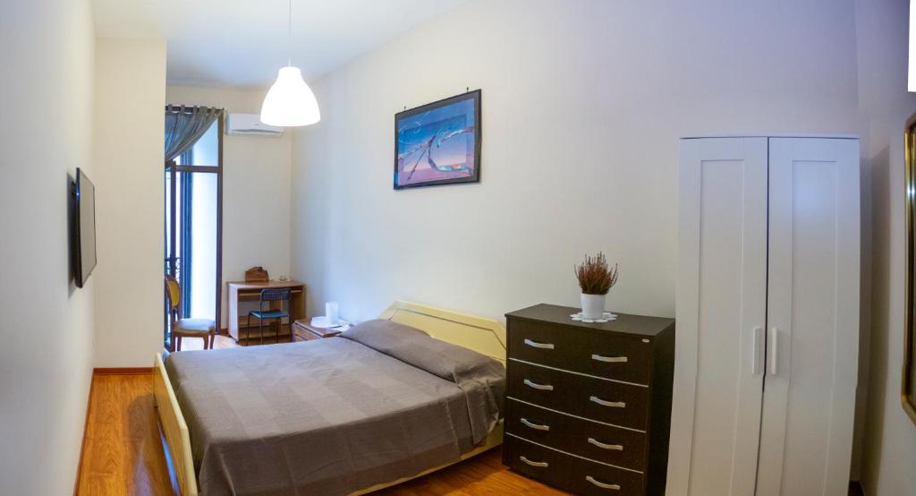 Uma cama ou camas num quarto em Relax in Centro