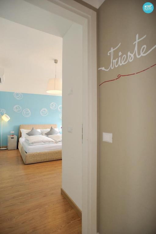 Postel nebo postele na pokoji v ubytování Stop & Sleep Udine Fronte Ospedale Civile